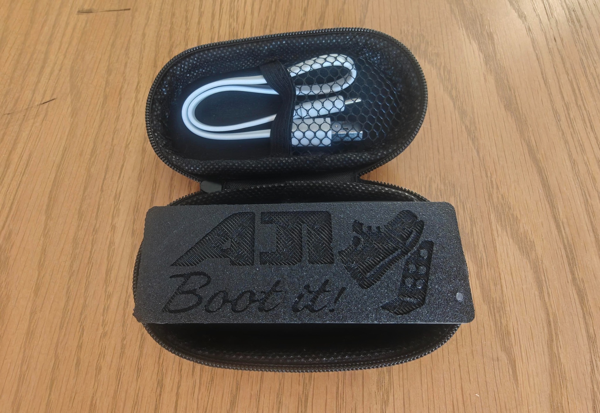 AJI Boot It case and cable