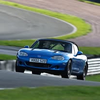Blue Honda S2000 on track